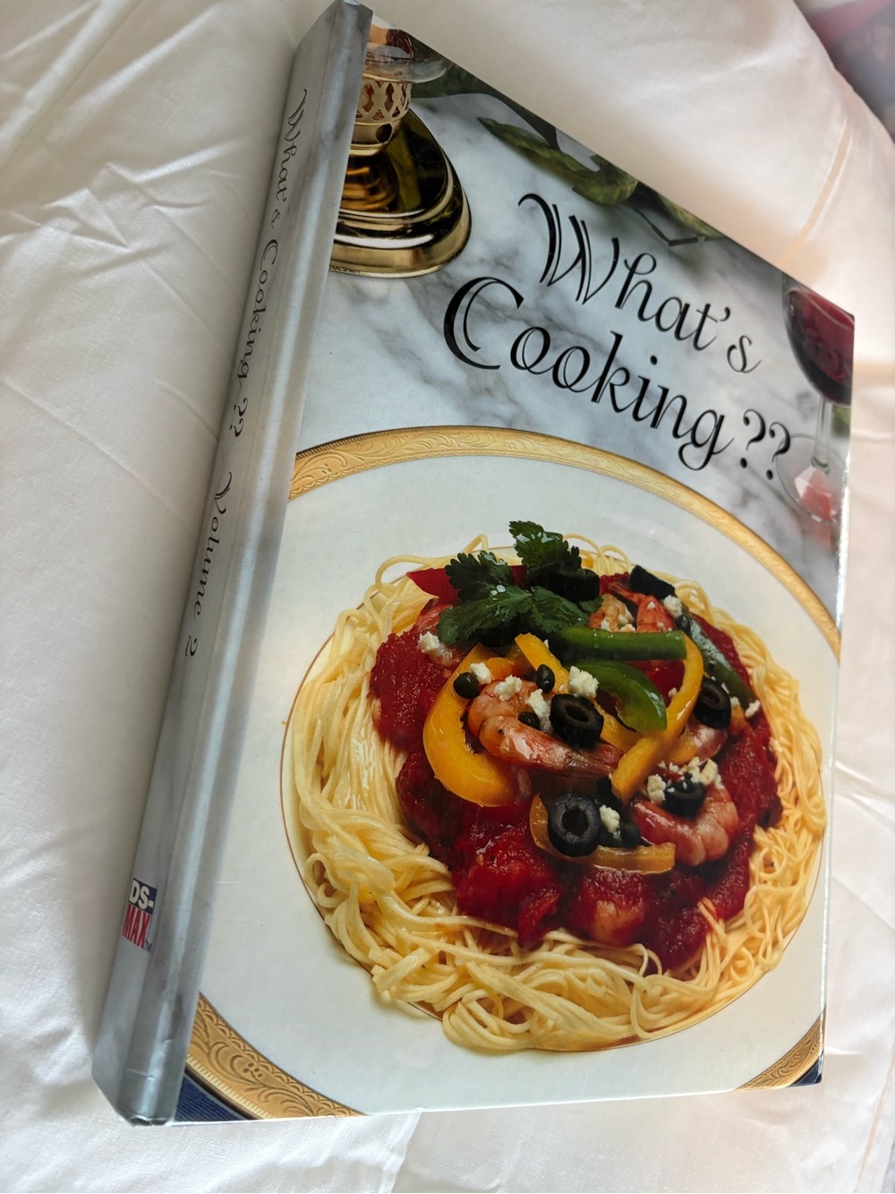 What's Cooking?? Volume 2 Hardcover Cookbook - White & Multicolor Cover